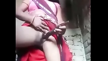 Puri is inserting the bandage buy her pussy.